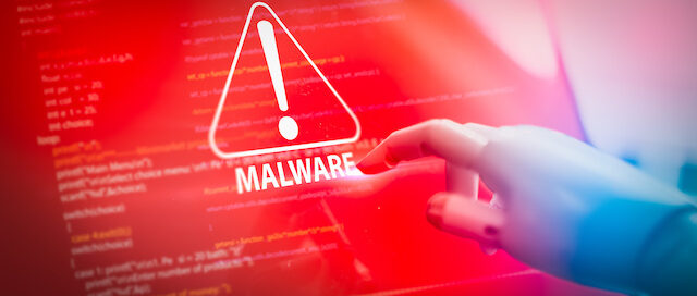 Robot hand pressing virtual button with online security and warning virus malware.AI(artificial intelligence) hand touching warning malware sign on screen laptop.